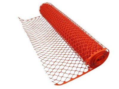 A roll of diamond warning barrier fence in orange.