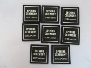 China Custom Estee Lauder 3d Soft PVC Lapel Garment Label Black Color For Open Ceremony , Durable And Waterproof on sale