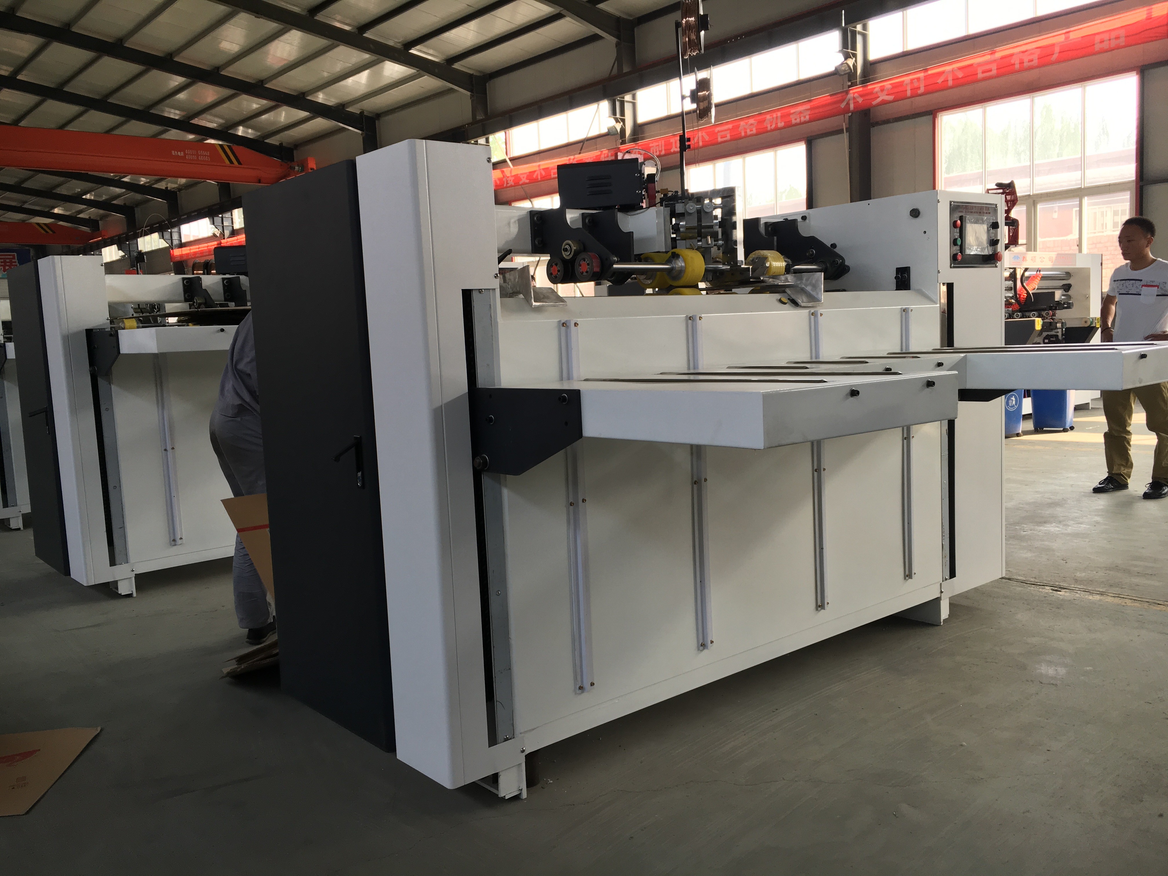 Steel Material Corrugated Box Stitching Machine Power 4HP Adopt Stepping Motor Driving