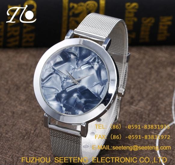 Unique wavy style and colorful dial for ladies watch with alloy strap