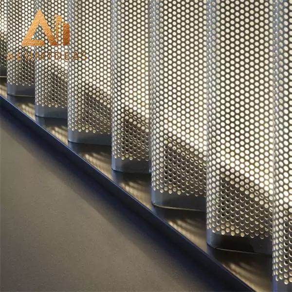 Perforated aluminum panel wall