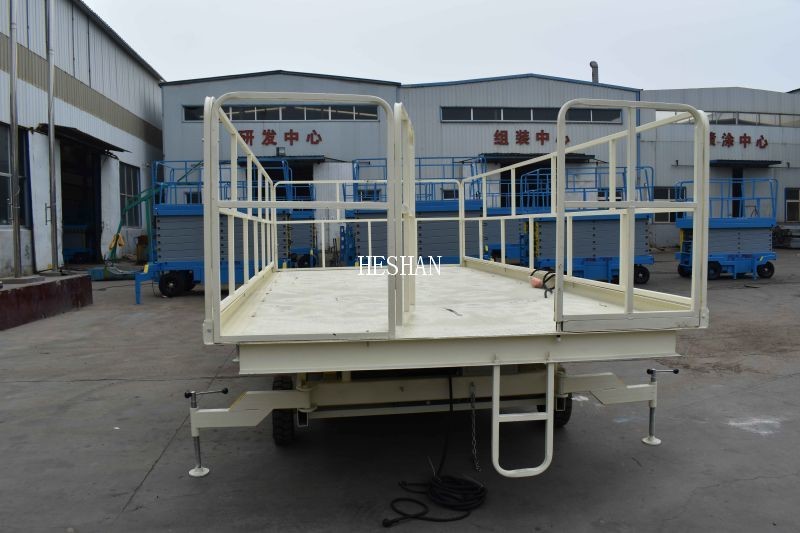 Custom large load factory warehouse electrohydraulic container load lift table