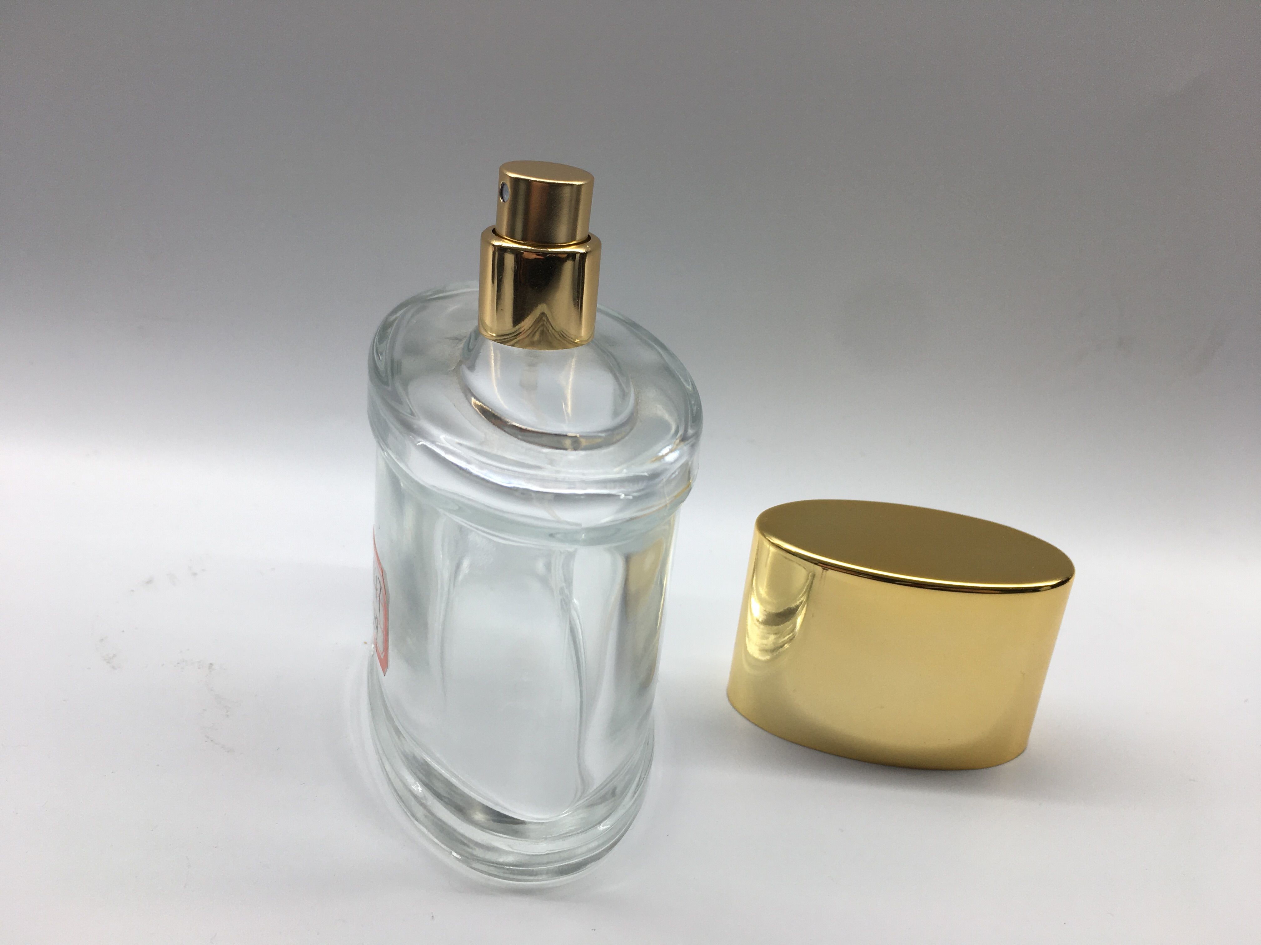 Oem Gradient Luxury Perfume Bottle Electroplating UV With Metallic Gold Atomizer