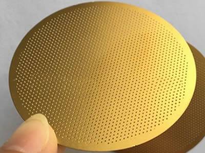 Brass perforated filter disc with unified, round and micro holes and margin.