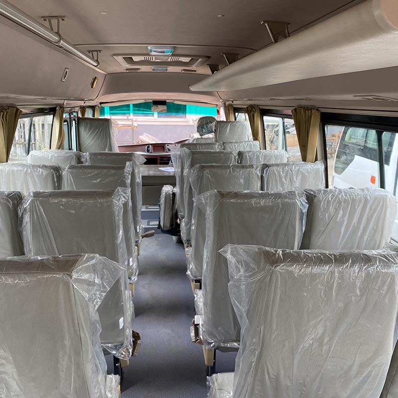 Electric Engine Capacity 4L Toyota Coaster Bus with 21 1 Seats and Right Hand Drive