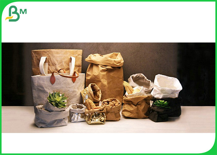 Waterproof  0.3mm 0.55mm Golden Color Washable Kraft Paper For Recycled Bag 