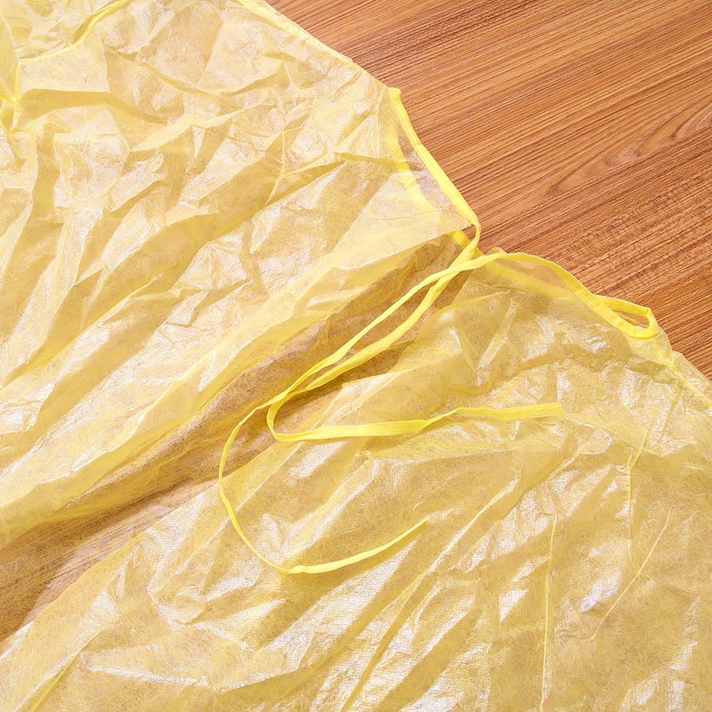 Disposable Pp Pe Coated Waterproof Non Woven Isolation Gowns Yellow Color