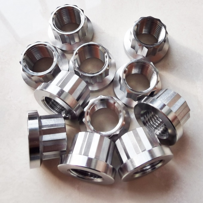 Universal Silver 1/2" -20 Titanium 12 PT Flange Nuts The Ultimate Combination of Strength and Versatility in Silver