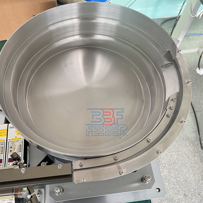 Adjustable Speed Vibrating Bowl Feeder Crown Lids Cap Feeder Machine