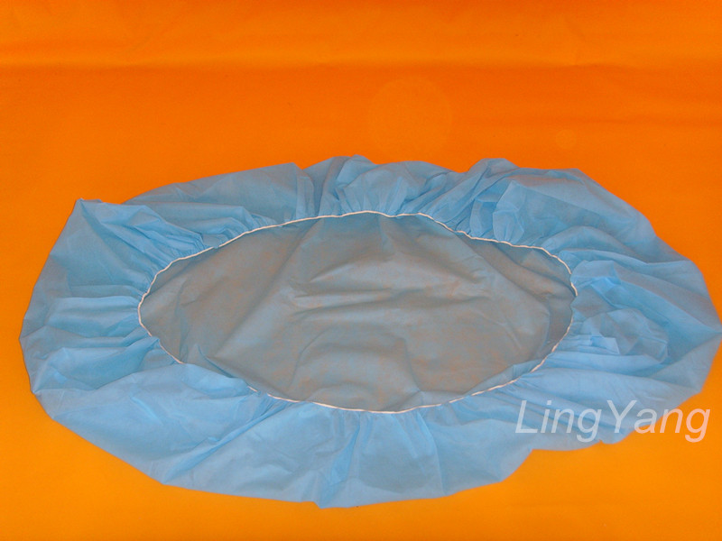 Disposable non woven bed sheet with elastic corner