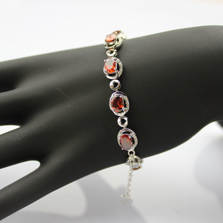 Sterling Silver 5x7mm Oval Garnet Cubic Zircon Tennis Bracelet(B06RED)
