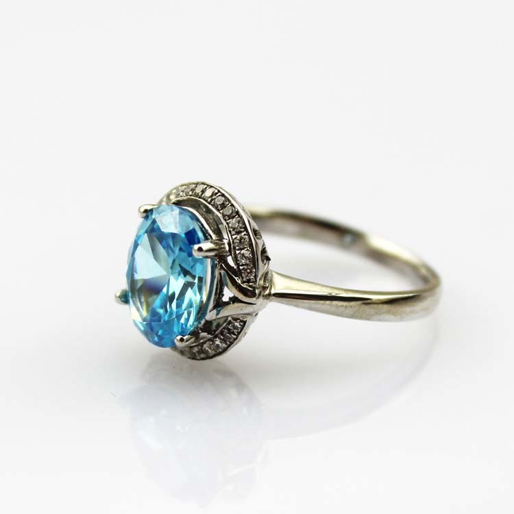 Sterling Silver 8mmx10mm Oval Blue Topaz Cubic Zircon Ring (R182)