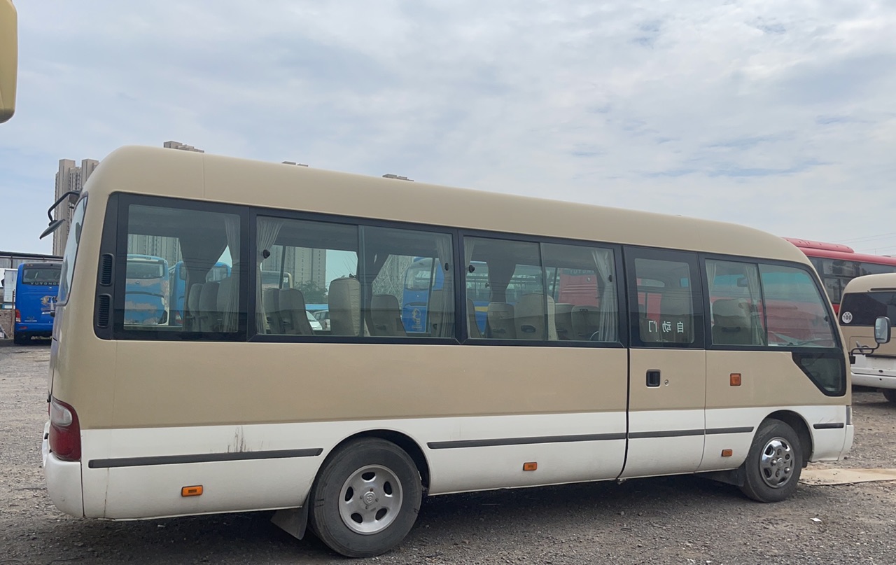 Good Condition LHD Diesel Coaster Bus with 2.4T Displacement and 19 Seat Capacity
