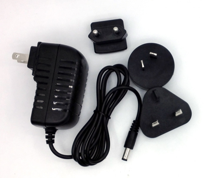 Interchangeable ac plug 12V 2A 1A 5V 2A 12v 5a power adapter with USA/Australia/Europe/UK plug dubai for LED .SET TOP