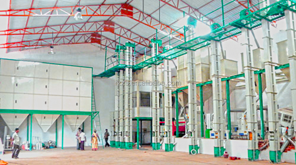 Workers Operate Complete Rice Milling Equipment Plant with 100 Ton Per Day Capacity