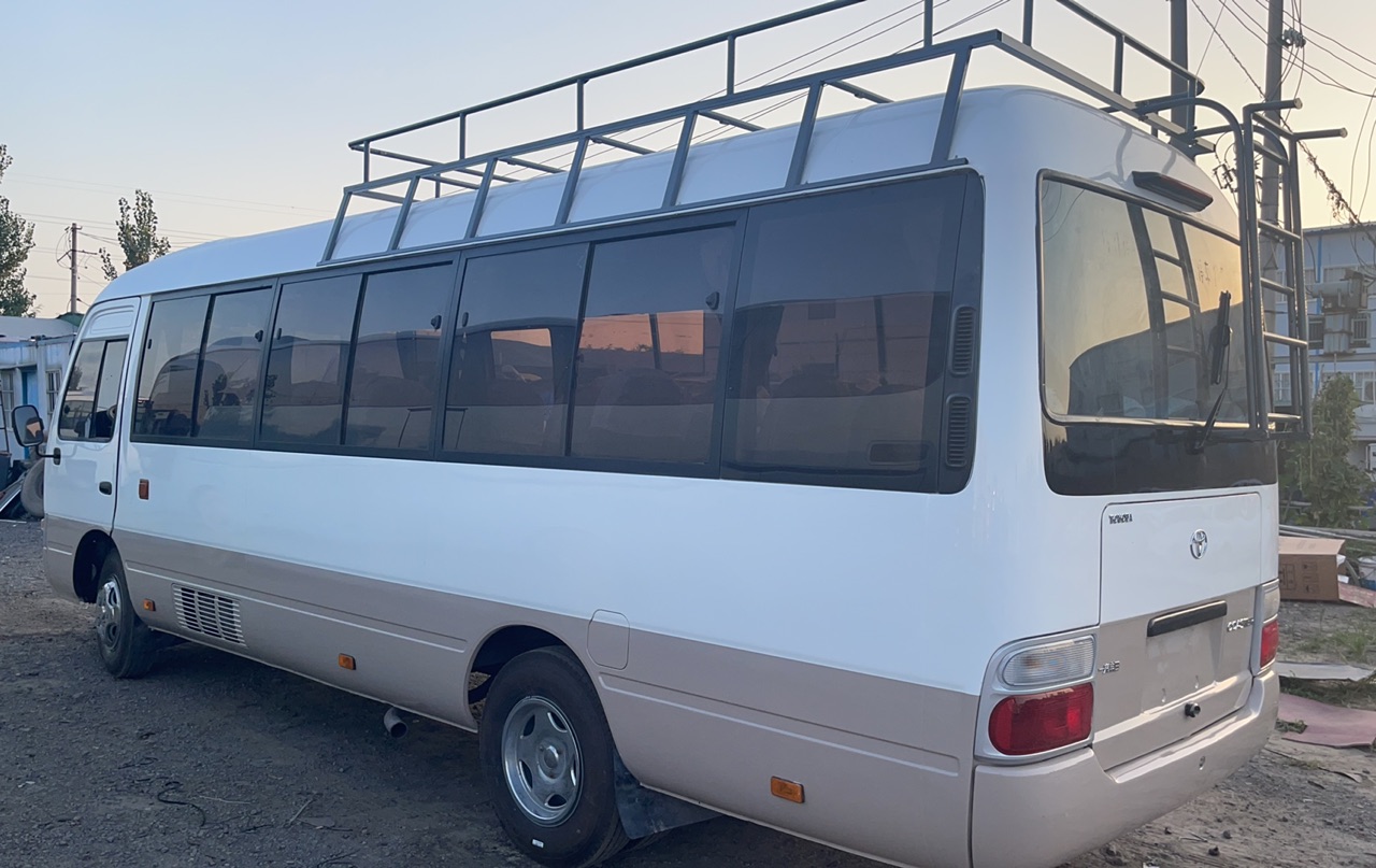 Front Mounted Manual Transmission Coaster Second Hand Bus with Overhead Luggage Rack