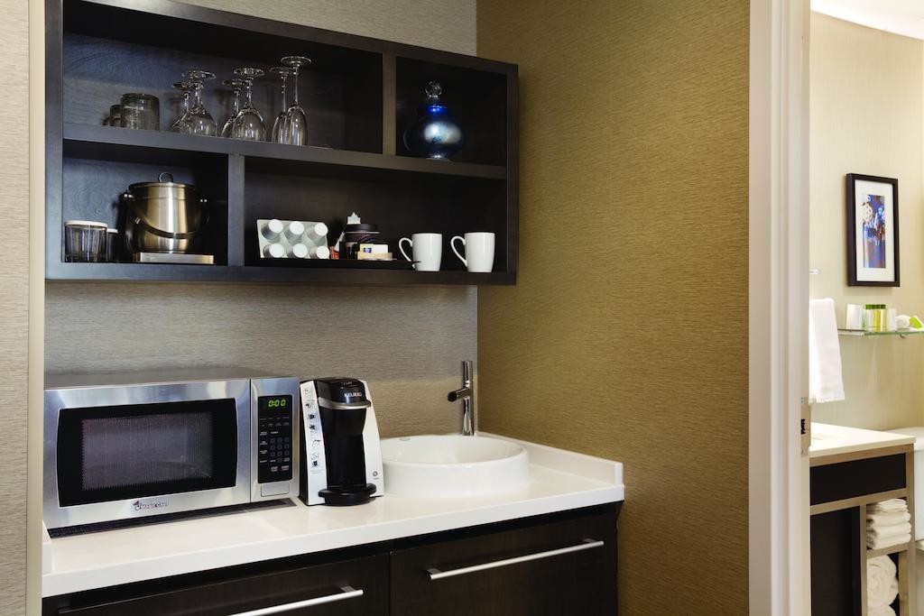 Hotel Executive Suite Bedroom Furniture Double Bed with TV storage Cabinets by Dark oak wood and Reception Living Sofa