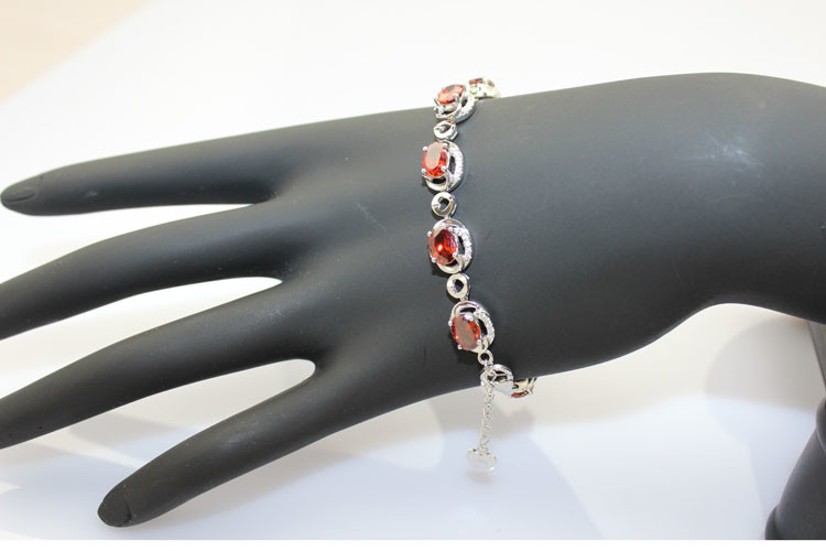 Sterling Silver 5x7mm Oval Garnet Cubic Zircon Tennis Bracelet(B06RED)