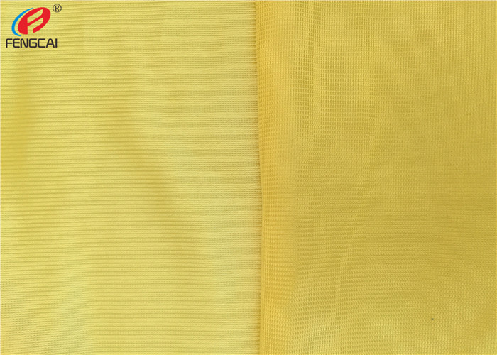 100 % Polyester Dazzle Fabric Sportswear Jersey Tricot Knit Fabric In Yellow Color