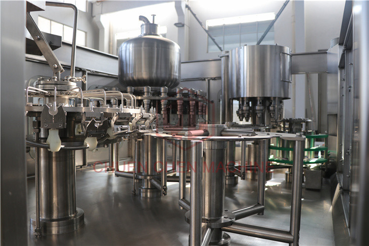Gravity Hot Juice Filling Machine 3 In 1 Rotary Liquid Filling Machine