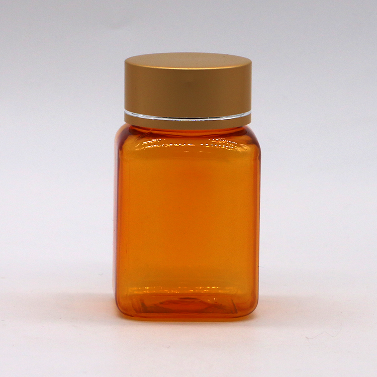 90ml/3OZ PET Square Yellow/Orange Capsule Pill Bottle with Rose Gold Cap and Heat Seal