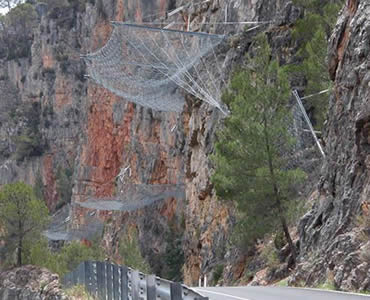 Slope protection rope mesh is installed vertically the slope instead of covering on the slope.