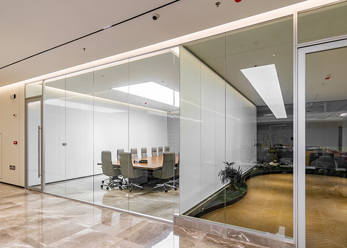 Enhanced Soundproofing And Thermal Insulation Partition Wall Indoor With White Black Frame Clear Glass