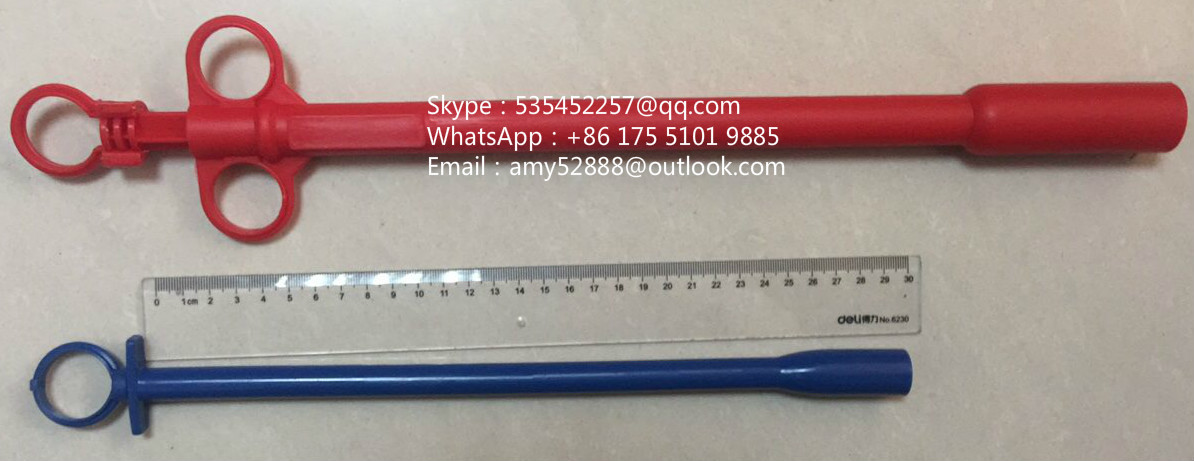 Bolus gun