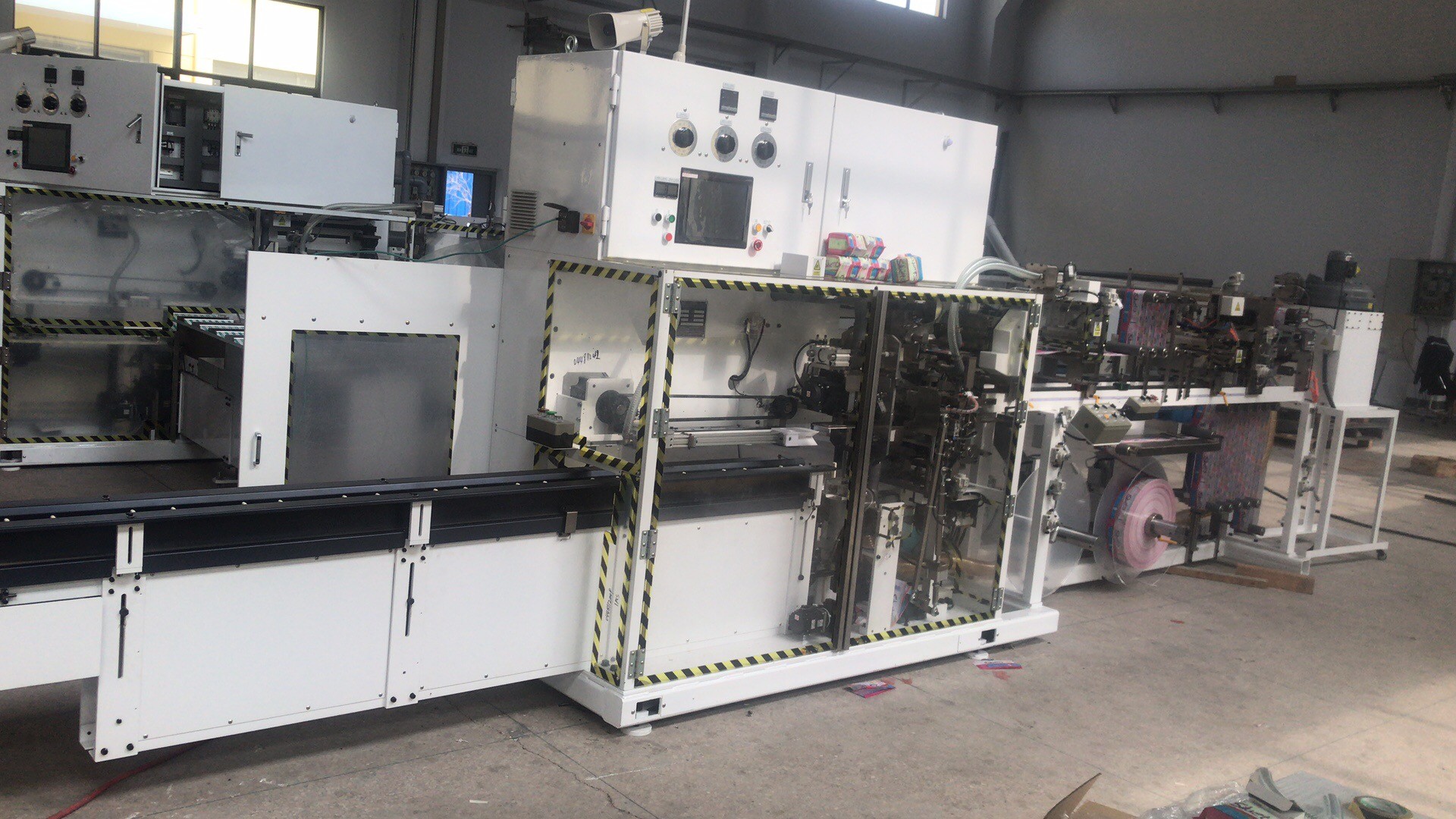 Multi Phased 55 Bags / Min Sanitary Napkin Packing Machine