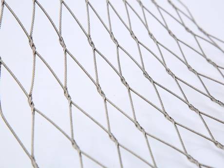 There is an interwoven wire rope mesh.