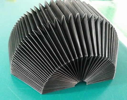 coated fabric bellows for lifting tables or round sewn to spiral springs to protect shafts ,columns and spindles used for jet cutting machines laser