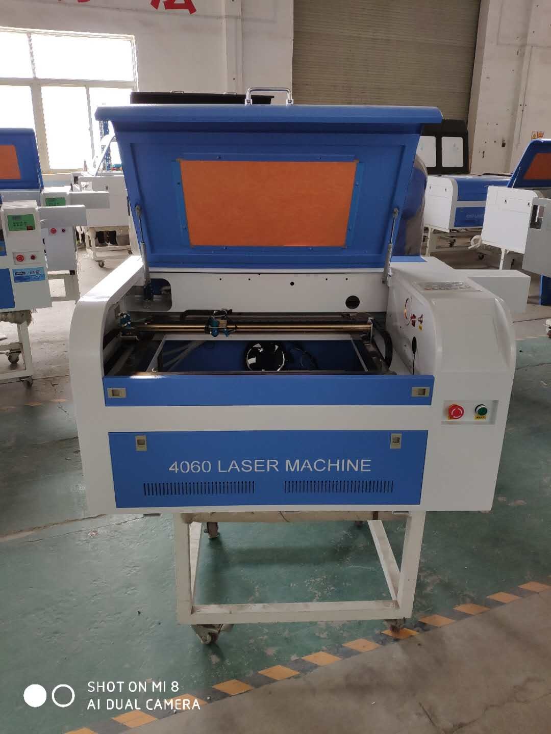 AC220V Coreldraw Wood Engraving Machine /Blue And White Laser Cutter Engraver 0-500mm/S