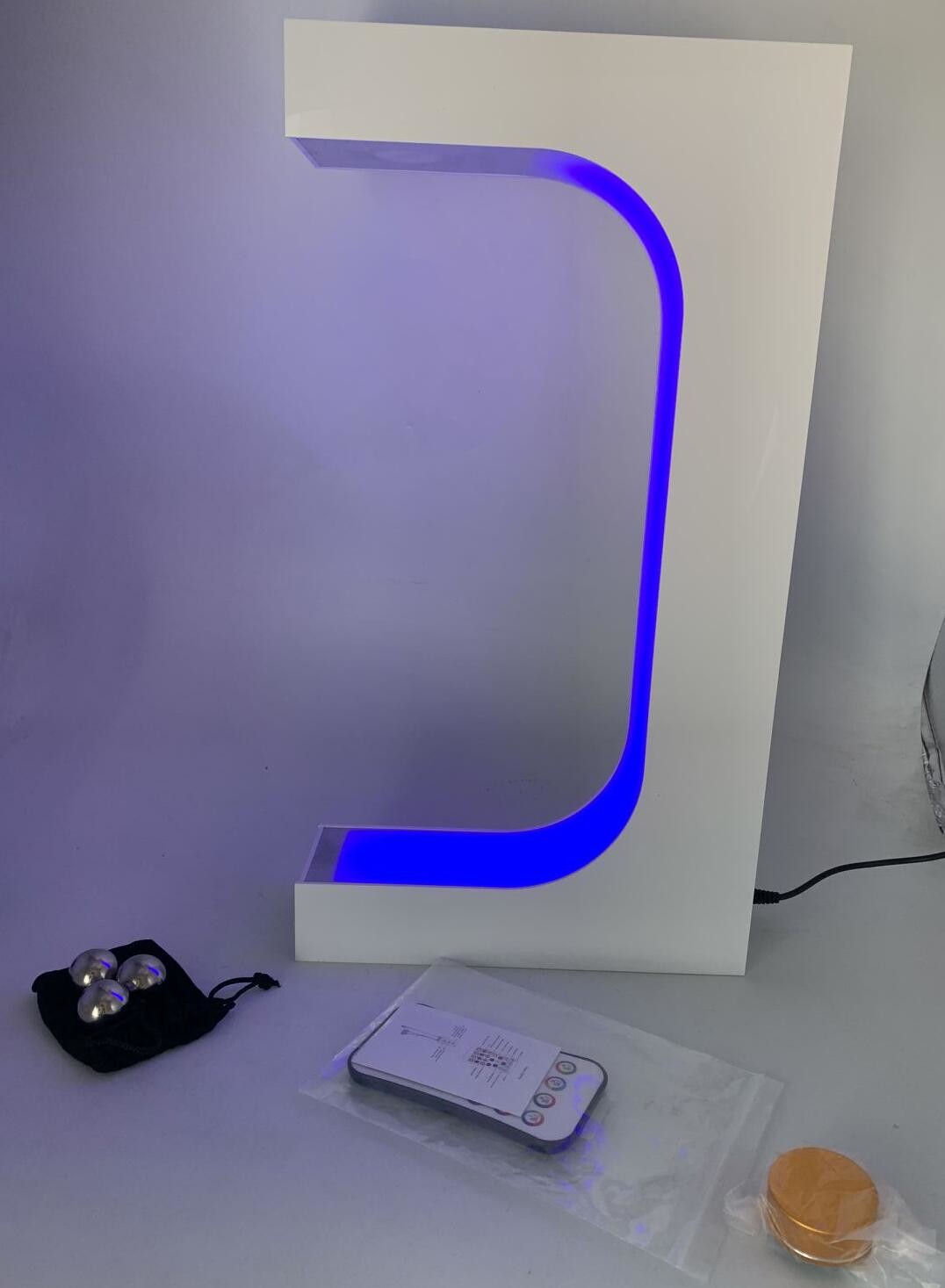 new customize magnetic levitation floating sport shoes display stand with remote controller