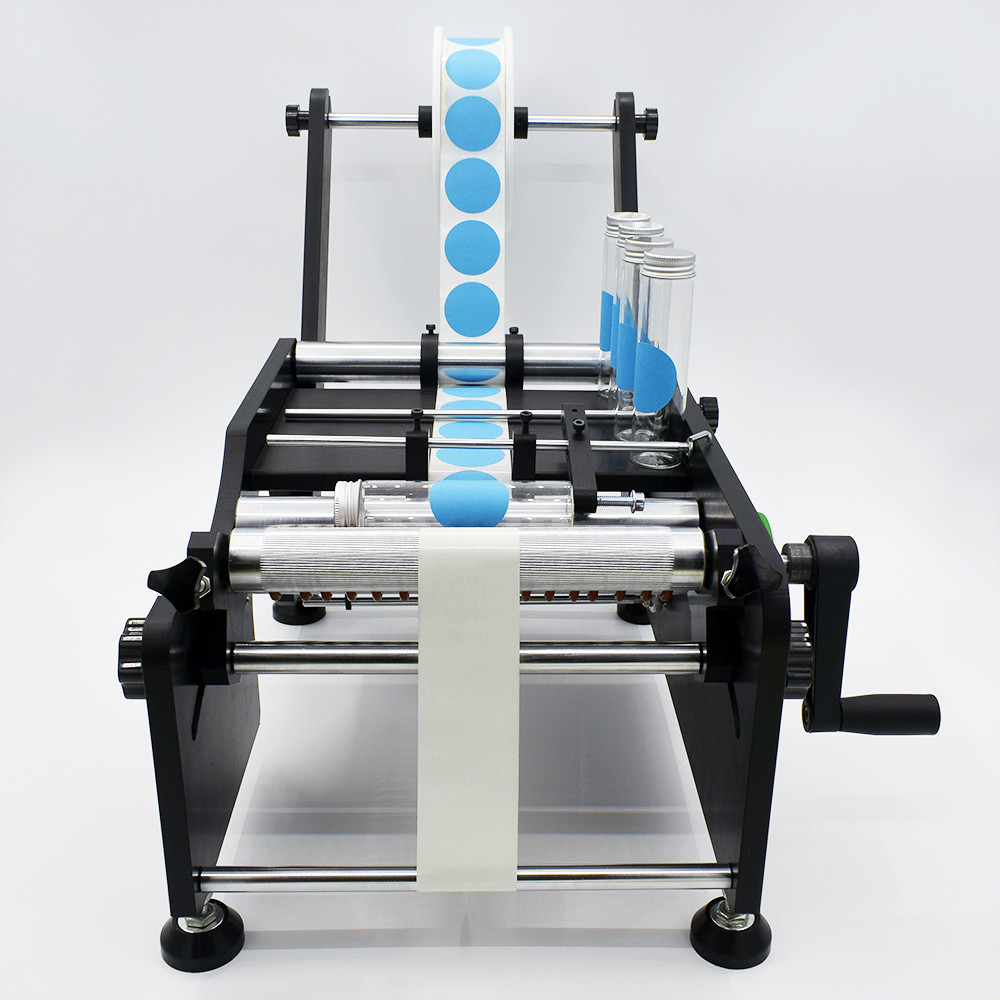 Manual labeling dispenser system for big bottles/small bottles TB-26S