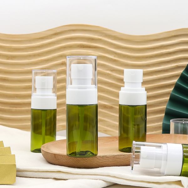 Green PET Plastic Spray Bottle with Light-blocking Leak-proof and Refillable Design for Cosmetic Skin Care