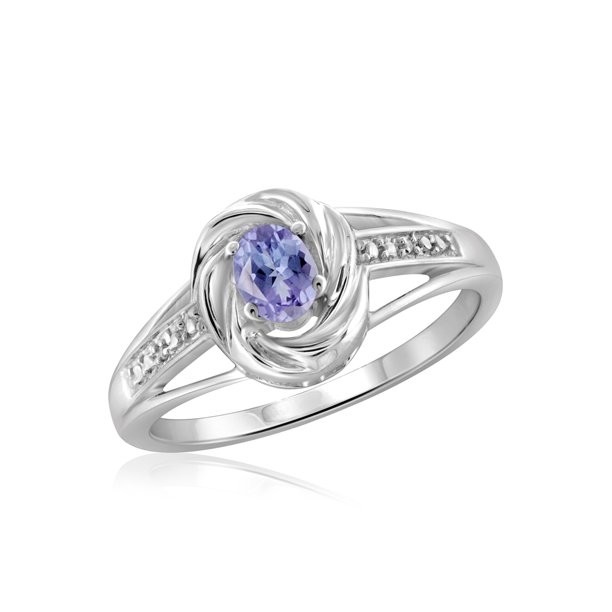 1.25 Carat 4 Prong Ovate Natural Tanzanite And Accent White CZ Sterling Silver Ring