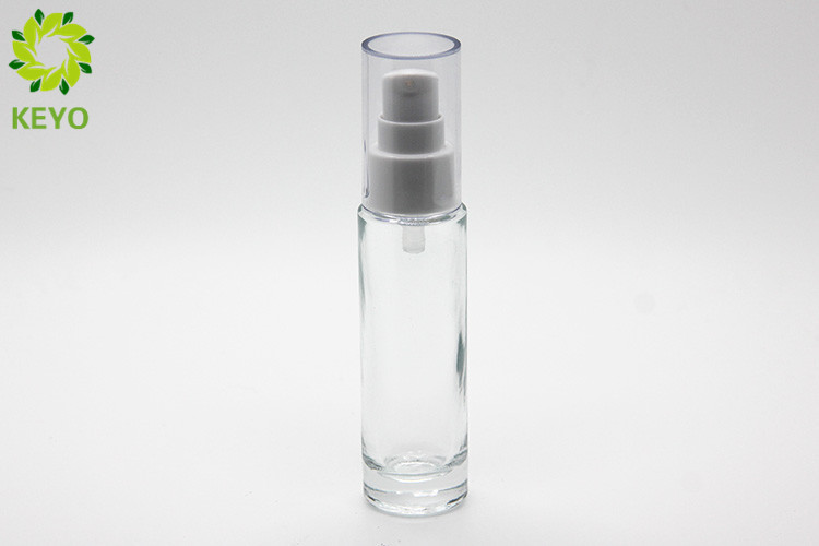 Clear Glass Foundation Bottle , Round Shape 30ml Empty Glass Pump Bottles