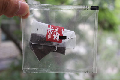 Eight electronic weigher pyramid flower tea bag packaging machine with envelop