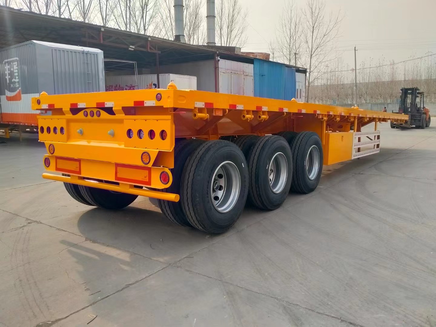 Best Price 40T-100T Flatbed Low Bed Semi Trailer 3-Axle Skeletal Semi-Trailer for Container Transport