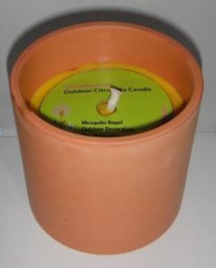 Yellow Citronella clay jar scented candle with the printed card