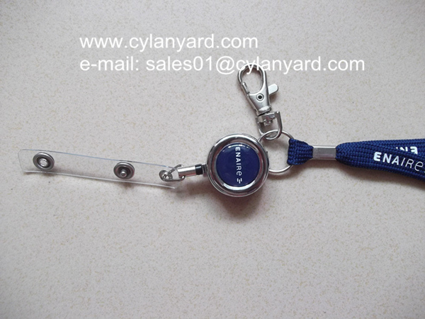 Id badge neck strap with metal pull reel