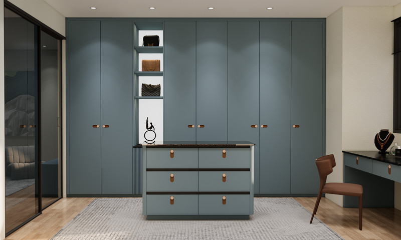 Blue Grey Custom Walk In Closet With Multi Drawer Island And Black Mirrored Vanity