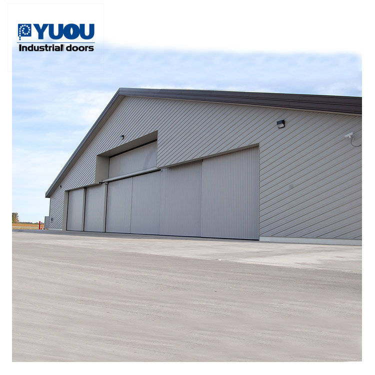 Steel Automatic Aircraft Hangar Door Revolving PU Sandwich Panel 50HZ 5000kg leaf