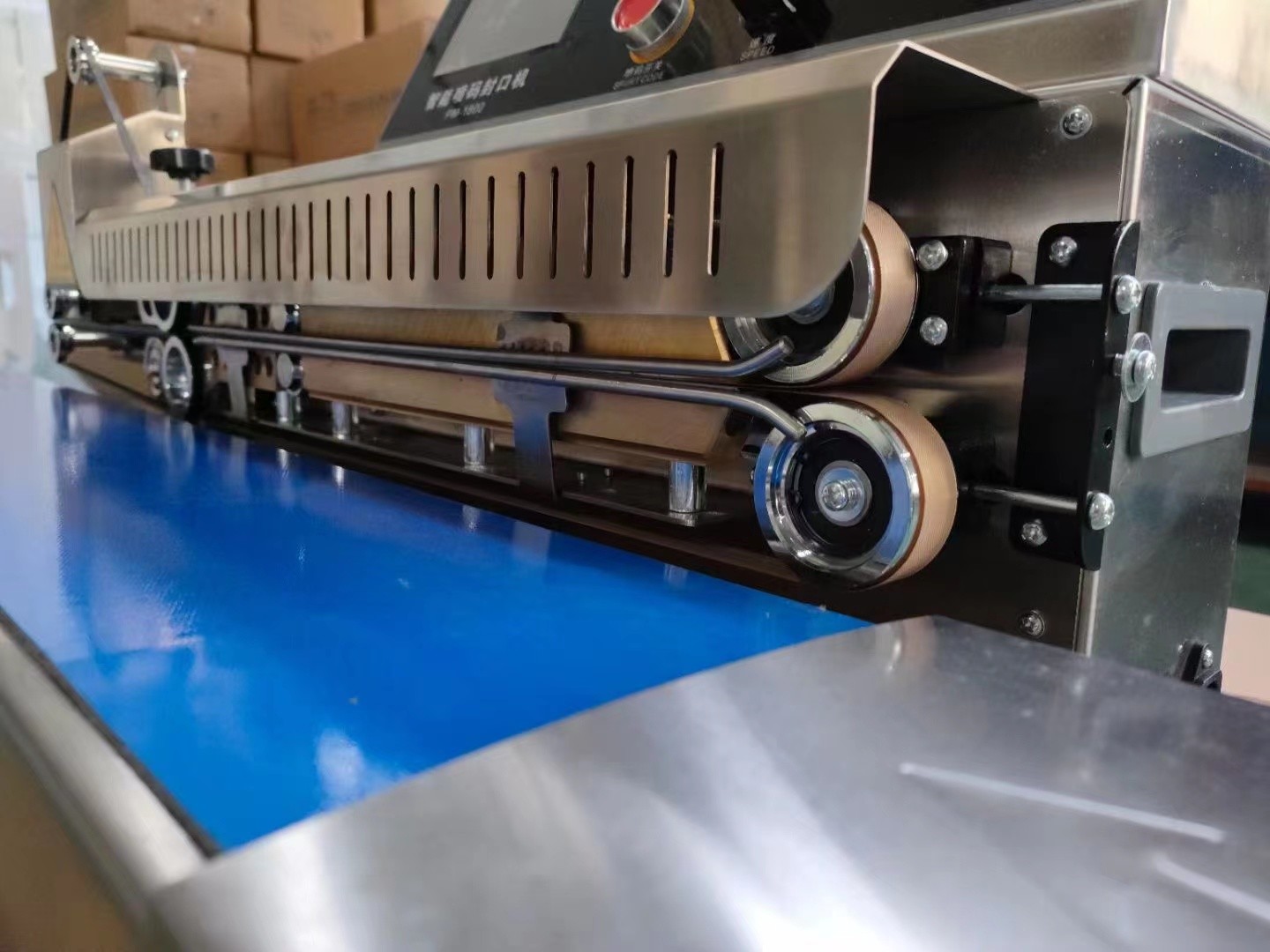 China Manufacturer Supermarket Plastic Bag Tape Neck Sealer Machine