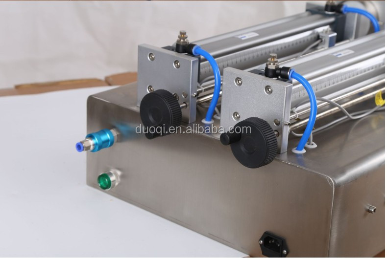 DUOQI Y2WTD Double Nozzle Liquid Filling Machine for Shampoo and Juice at 0.4 Mpa Pressure