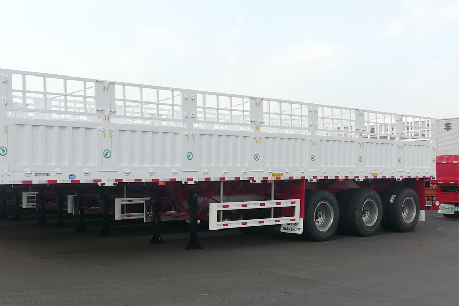 CIMC 12400*2500*2000mm Curb weight 7T 12.4M 3 Axle 10pcs leaf spring 19T single action outrigger 40T payload Stake Semi Trailer