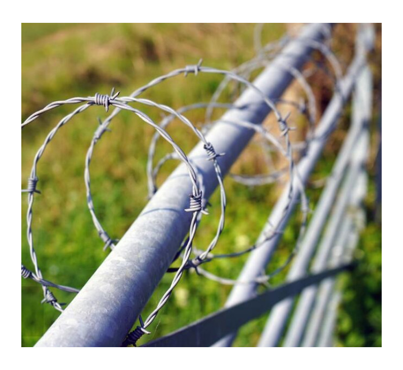 Spiral Barbed Wire Defensive Galvanized Barbed Wire Installation Security Fence