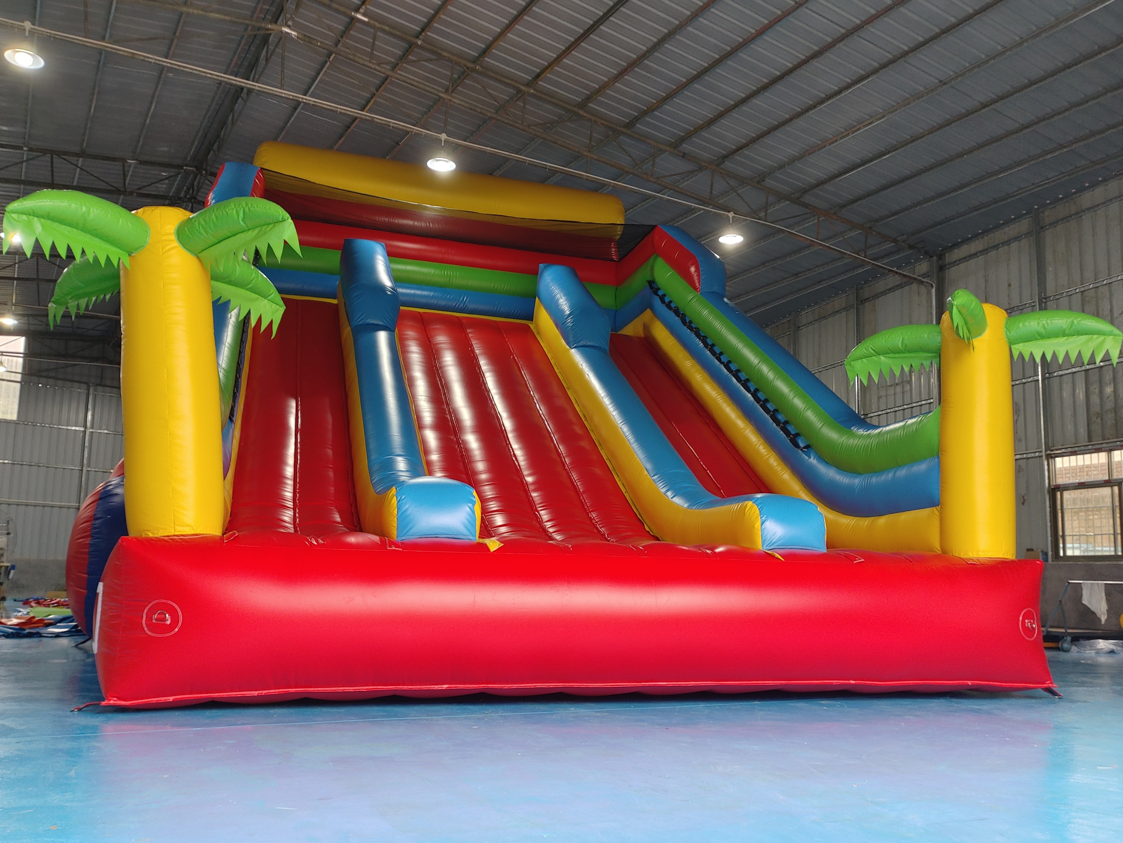 New Design Tarpaulin Fireproof Commercial Inflatable High Slide Palm Theme Giant Inflatable Slide Castle For Kids And Ad