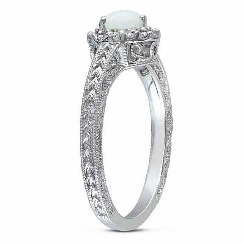 Oval Lab-Created Opal, Blue and White Sapphire Open Frame Twist Shank Ring in Sterling Silver