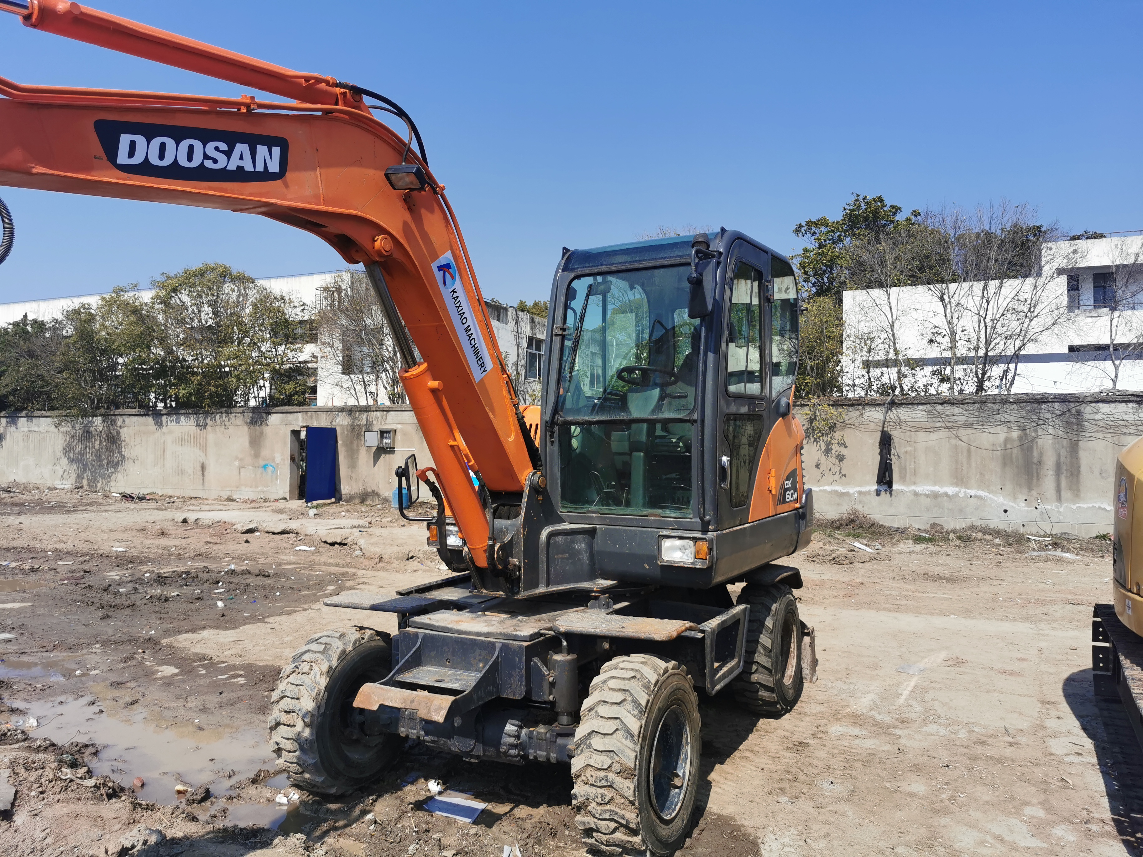 Doosan DX60W Wheel Excavator with YANMAR Engine and 0.21m3 Bucket Capacity